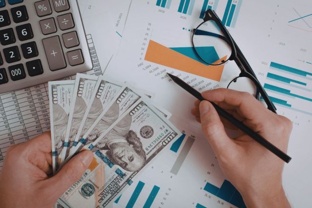 The man calculated whether he had received the correct amount of compensation for the workers.